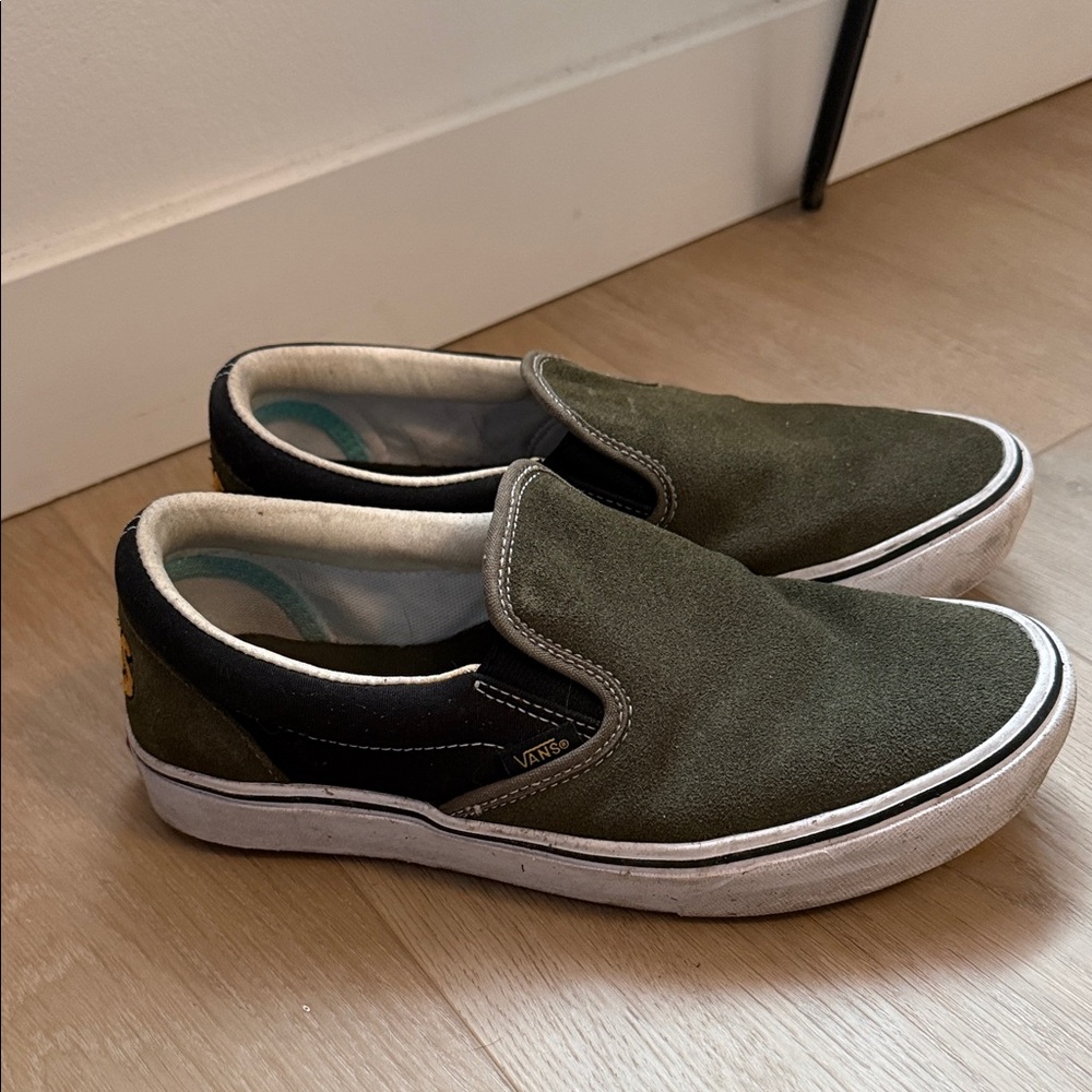 Vans Slip-On Canvas Sneakers in Olive Green and Black